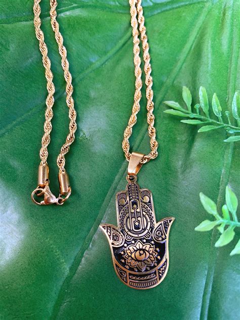 The Gold Hamsa Necklace could be a excellent current