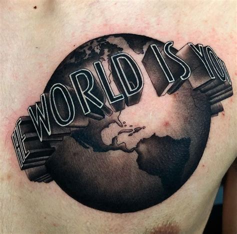 The Universal Symbol of Liberation: Unveiling the Majestic Design of The World Is Yours Tattoo