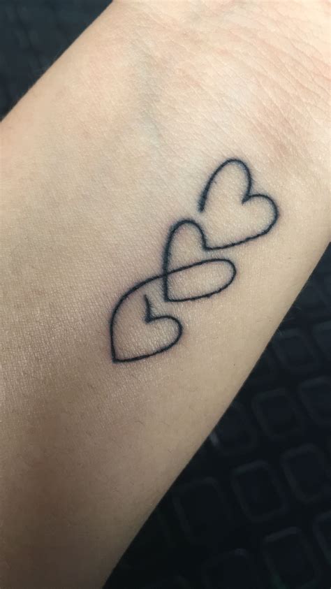 Three hearts for my three children. Tattoos for