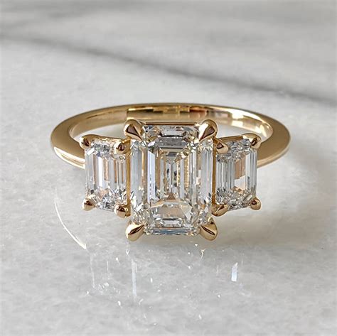 Three Stone Emerald Cut Ring