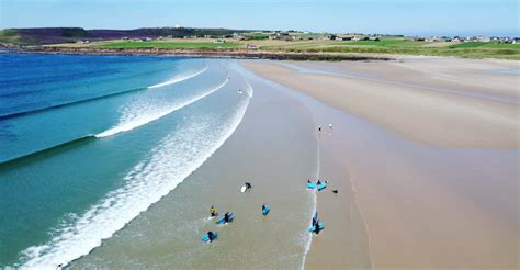 Thurso beach surfing