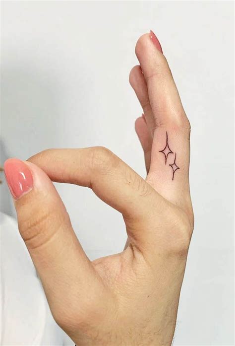 Tiny Inside Finger Tattoos