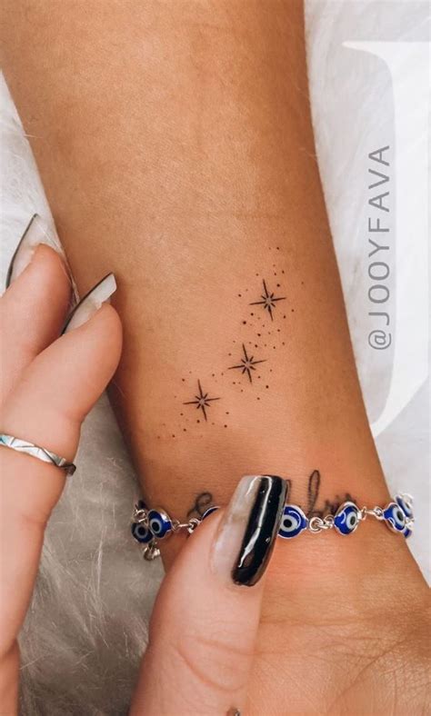 Tiny Star Tattoo