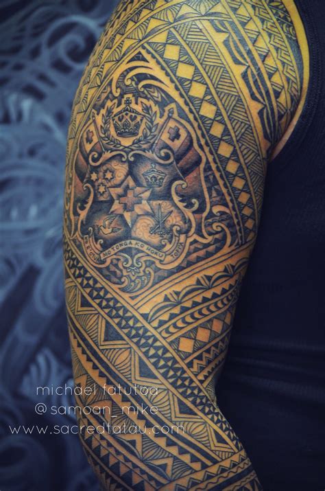 Poly tribal tattoo with a Tongan seal in the middle of the