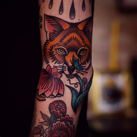 Traditional fox tattoo by Łukasz Krupiński
