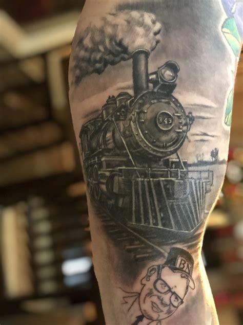 train tattoo by Kimmo Angervaniva La Muerte