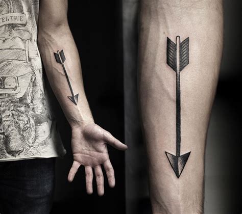 Five different similar tribal arrow tattoos Girly