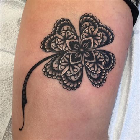Black tribal with irish clover tattoo on stomach Tattoos