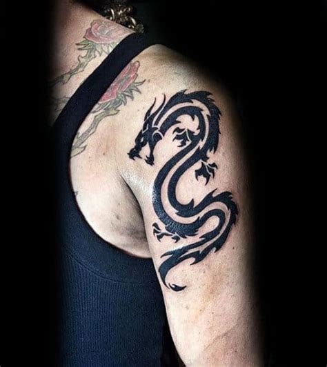 Tribal Dragon Arm Tattoo