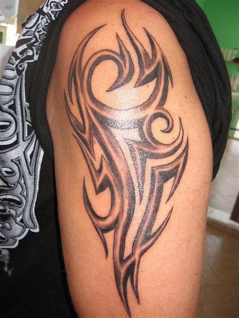Chest & Sleeve Tribal Tattoo Best tattoo design ideas