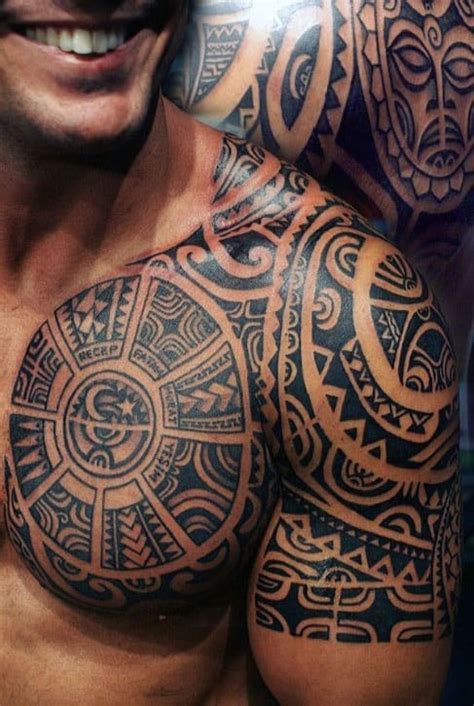 Tribal Tattoo On Chest And Shoulder