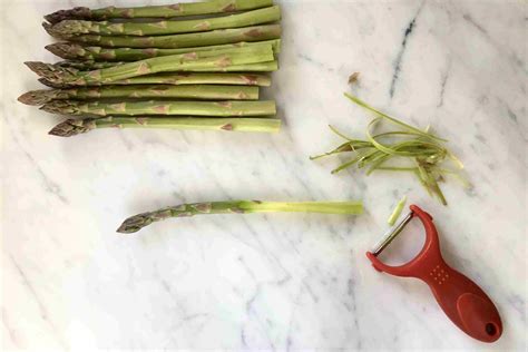 Trimming and peeling asparagus spears