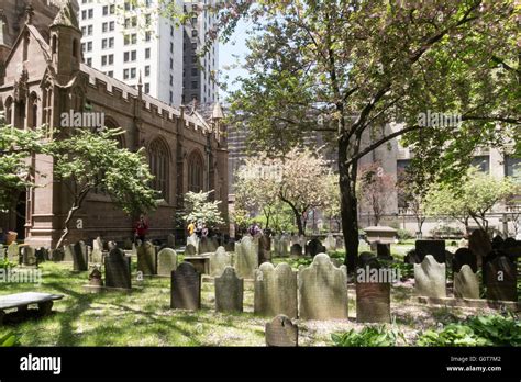 A picturesque scene showing the peaceful grounds of Trinity Church Cemetery in New York City.