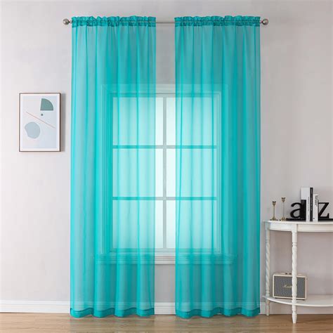 Turquoise Curtains with Geometric Patterns