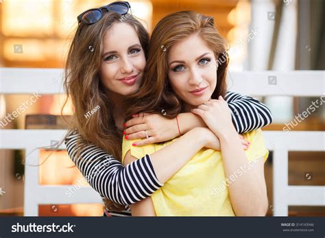 Two Friends Hugging