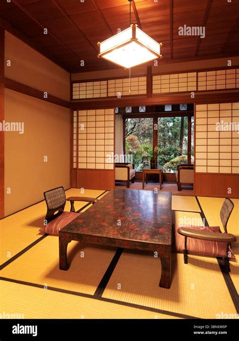 The interior of a typical Japanese ryokan, featuring tatami mats