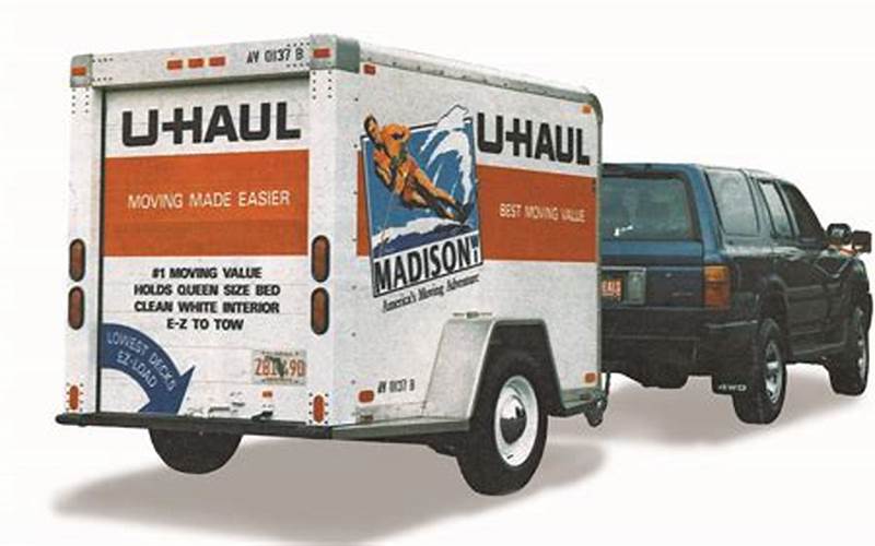 U-Haul Truck With Car Trailer