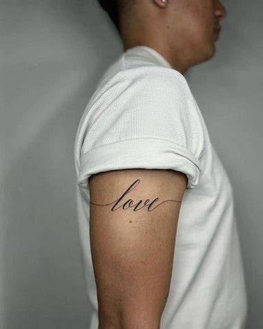 Upper Arm Name Tattoo
