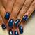 Velvet Nightfall: Wrap Your Nails in Luxurious Dark Blue Nail Colors This Fall