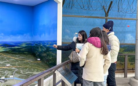 Vietnamese guide explaining the DMZ tour