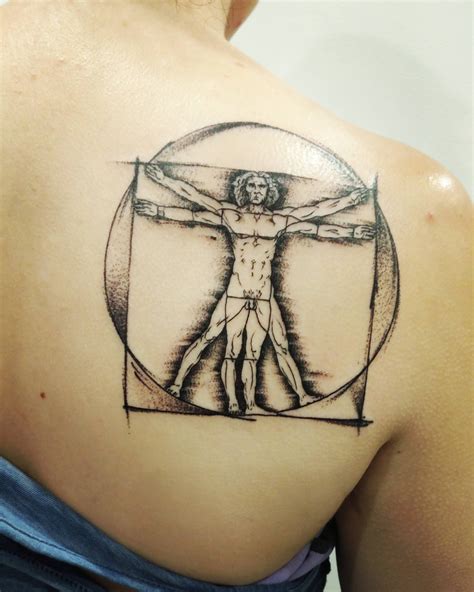 Single needle Vitruvian Man tattoo on the stomach