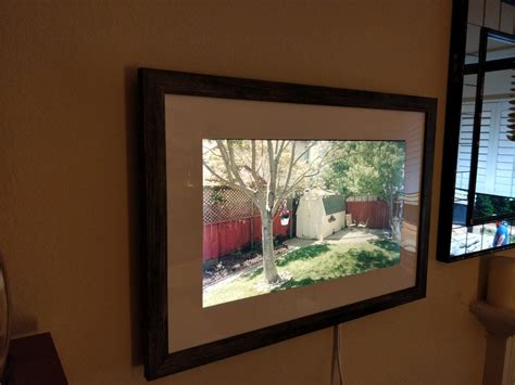 Digital Picture Frames Have Grown Up Into Wall Art HGTV Smart Home 2017 Behind the Design HGTV