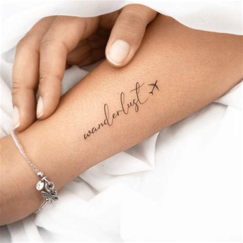 Wanderlust Paper Airplane Tattoo