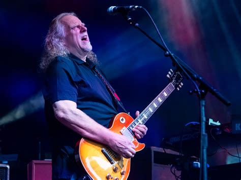 Warren Haynes performing on stage