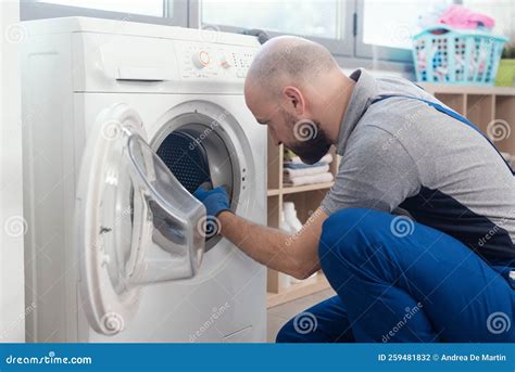Washer Repair Technician Checking a Machine