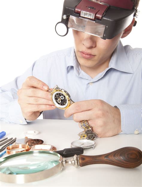 Watch Repair Technician Examining a Watch