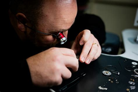 Watchmaker at Work Repairing a Watch
