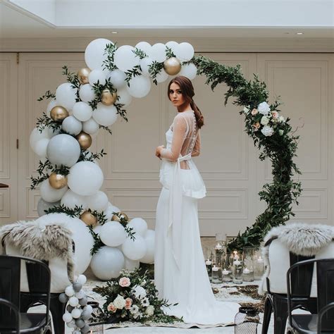 Bursting with Love: Elevate Your Nuptials with a Stunning Wedding Arch Adorned with Balloons