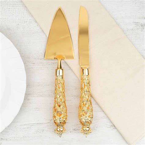 Make the First Cut Extra Special with our Exquisite Gold Wedding Cake Knife Set: Indulge in Pure Elegance and Bask in Precious Memories!