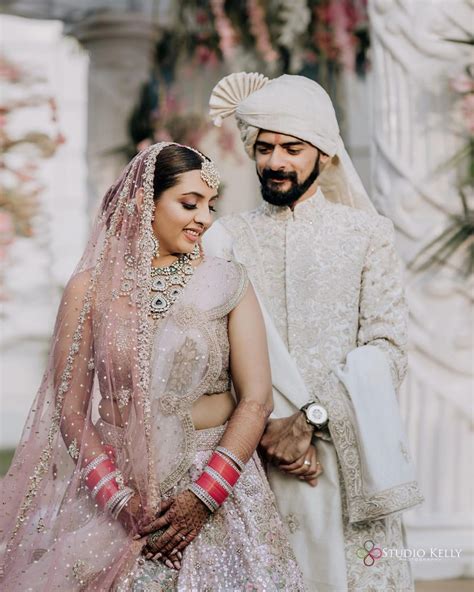 Mesmerizing Ensembles: Elevate Your Special Day with the Perfect Wedding Outfit for Bride and Groom