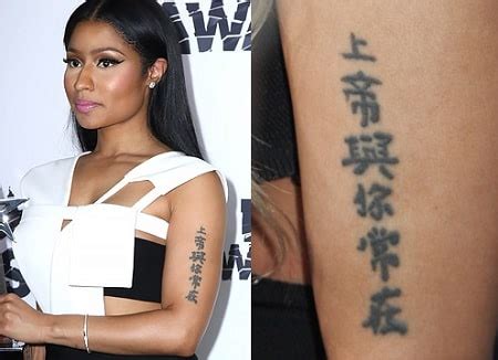 What Does Nicki Minaj Tattoo Say