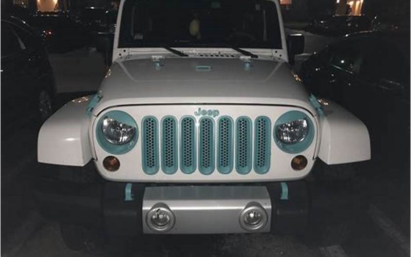 White And Teal Jeep Waxing