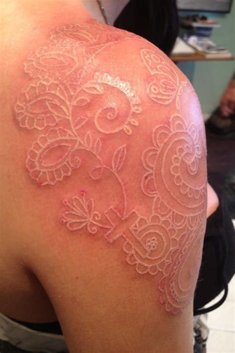 White Lace Tattoo Under Breast Tattoo Idea