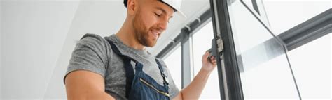 Window Repair Technicians Examining a Window