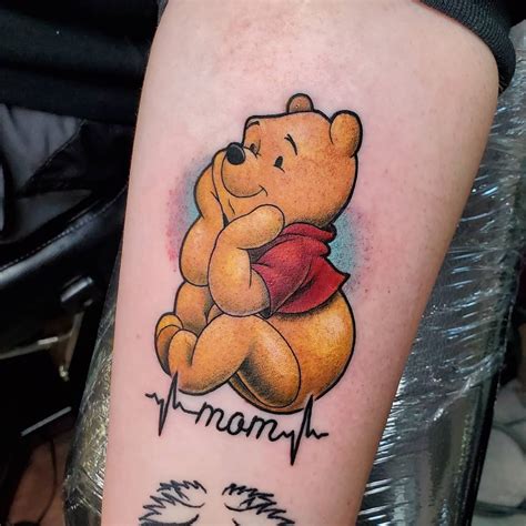 Honey-Dipped Ink: Unleashing the Whimsical World of Winnie The Pooh Tattoos