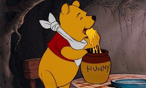 Winnie the Pooh eating honey