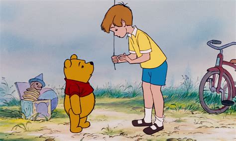 Winnie the Pooh talking to Christopher Robin