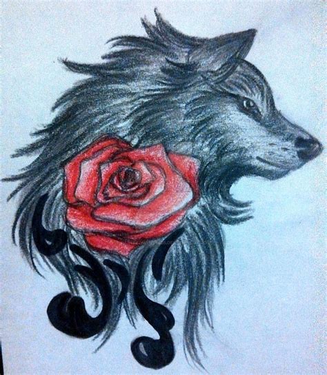 Wolf With Rose In Mouth Tattoo by mark at dinosaur studio