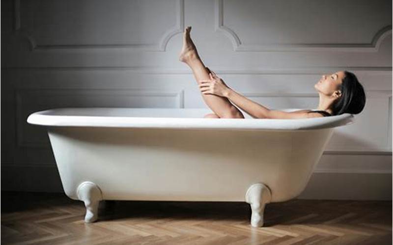 Woman Relaxing In Tub