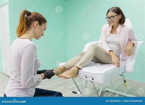 Woman Getting Professional Pedicure Beauty