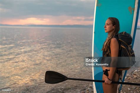 Woman Preparing SUP