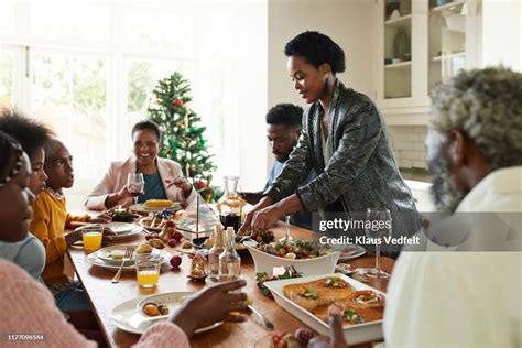 A woman lovingly serving home-cooked food