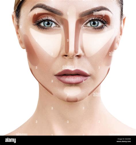 Woman contouring her face with makeup