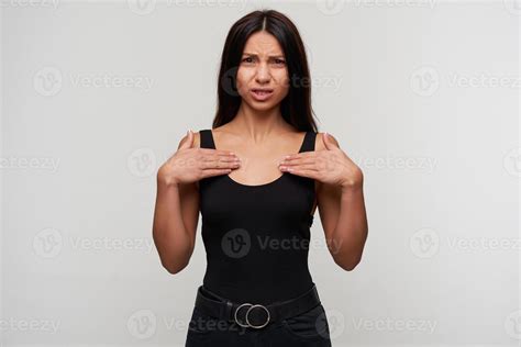 Woman looking at her chest