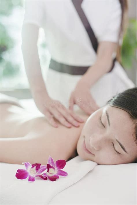 Woman receiving Chinese massage