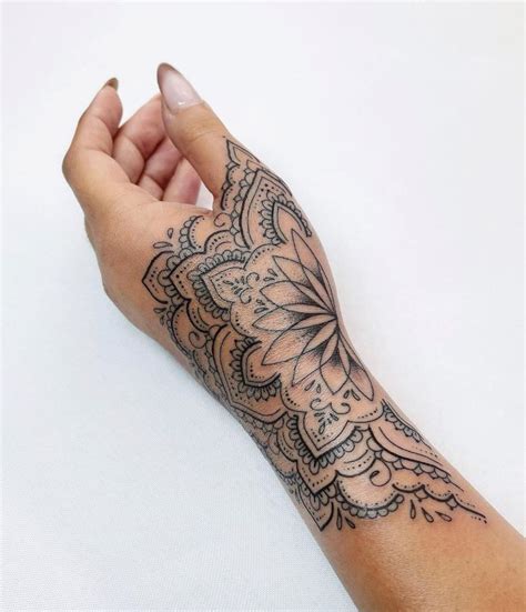 Womans Hand Tattoo